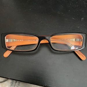 Prada glasses .